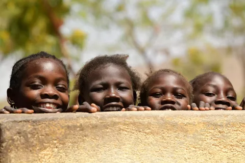 Children at the water well of their school, Cameroon.
