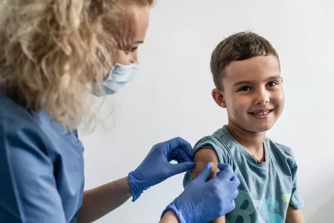 6-year-old Mykyta receives his immunizations