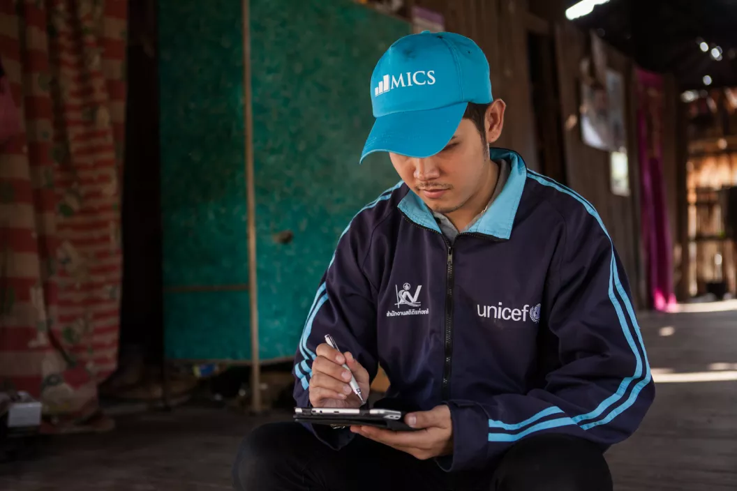 National Statistical Office staff uses tablet pc in collecting data during a UNICEF-supported Thailand survey