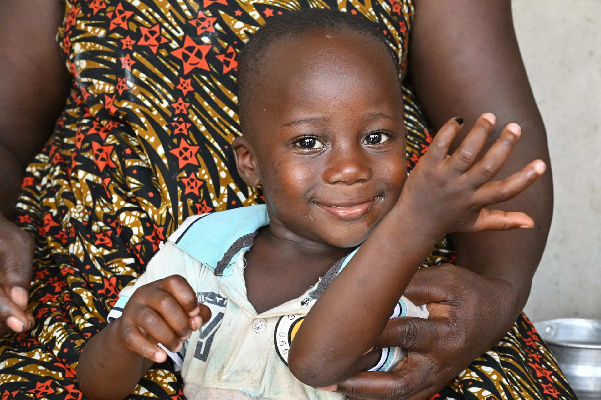 A 3 year old boy received a vitamin A supplement in a village in Côte d'Ivoire